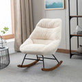 Fauteuil à bascule capitonné en tissu bouclé