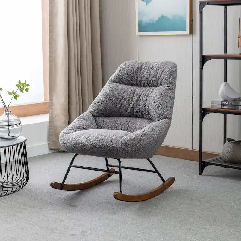 Fauteuil à bascule capitonné en tissu bouclé
