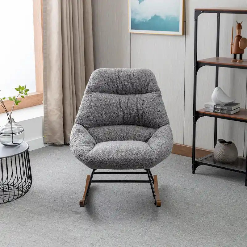 Fauteuil à bascule capitonné en tissu bouclé