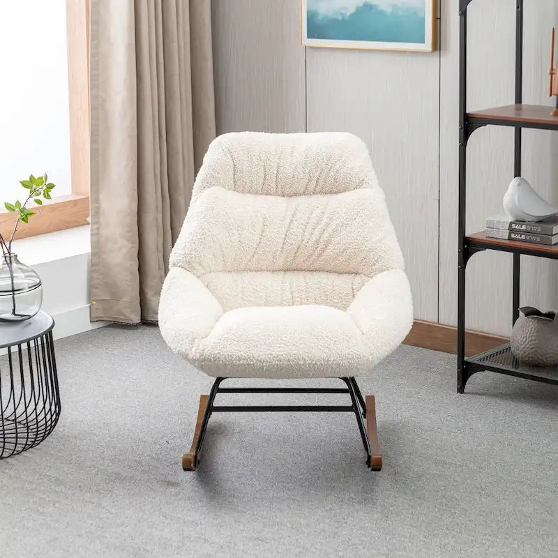 Fauteuil à bascule capitonné en tissu bouclé