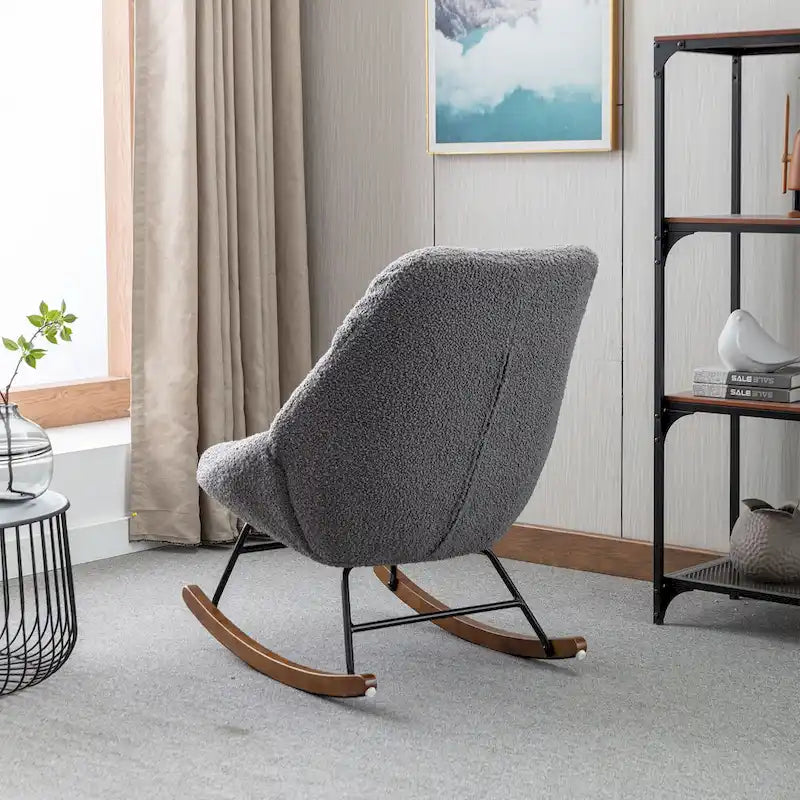 Fauteuil à bascule capitonné en tissu bouclé