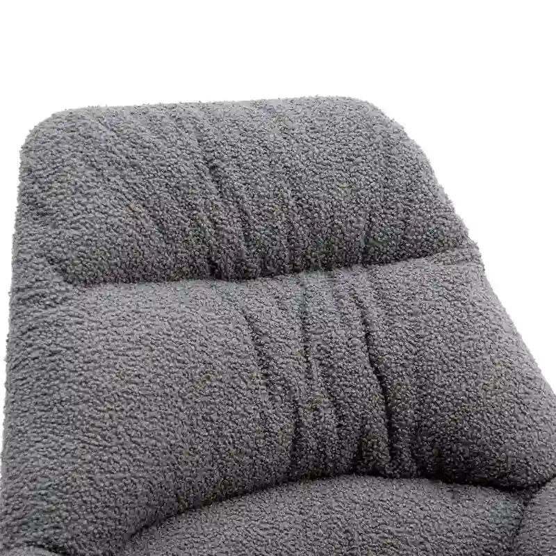 Fauteuil à bascule capitonné en tissu bouclé