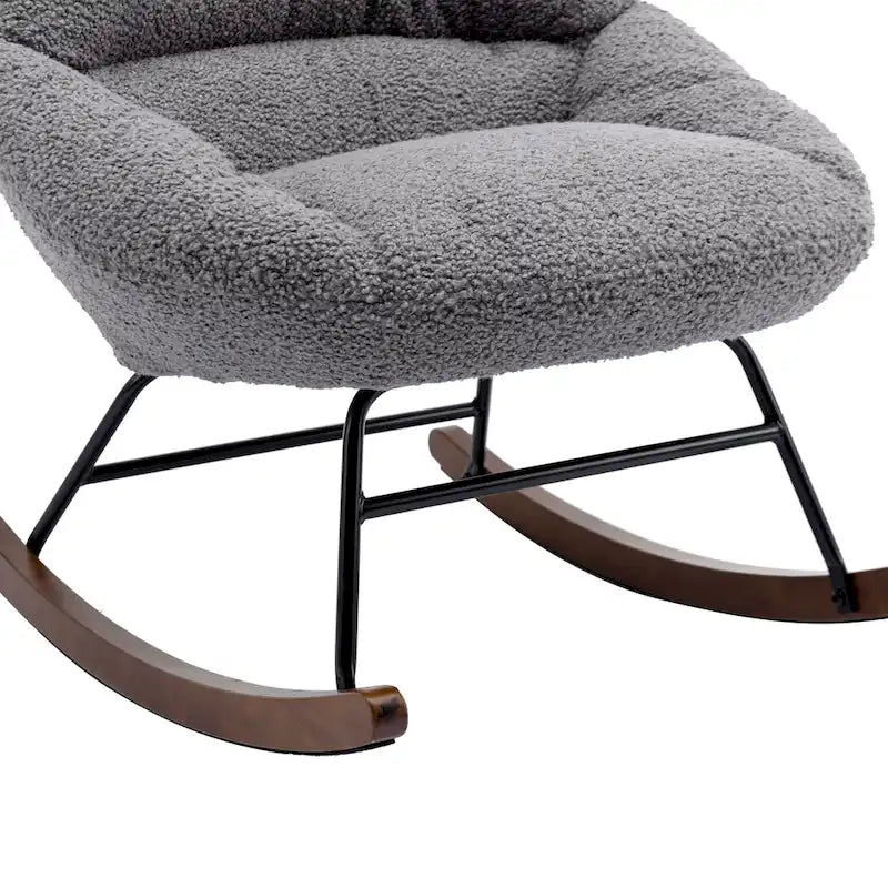 Fauteuil à bascule capitonné en tissu bouclé